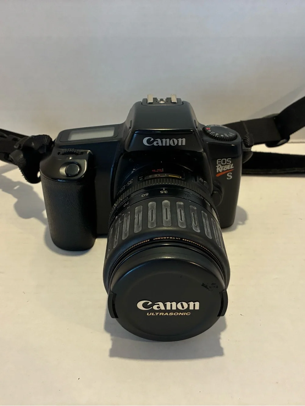 Canon EOS Rebel S DSLR Camera in Black with Canon Ultrasonic Lens Cap